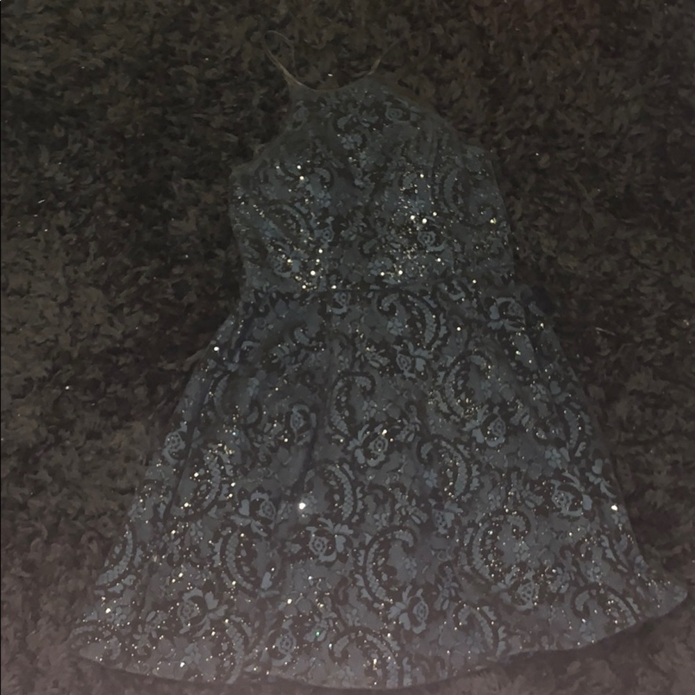 green and black sparkly dress